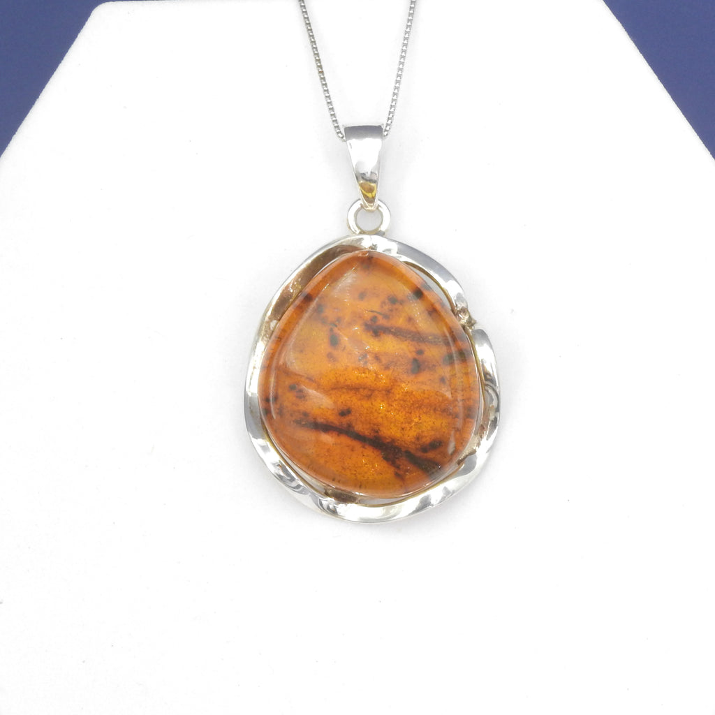 Sterling Silver Amber Pendant w/ Wavy Setting