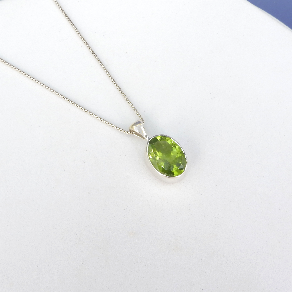 Sterling Silver Faceted Peridot Oval Pendant