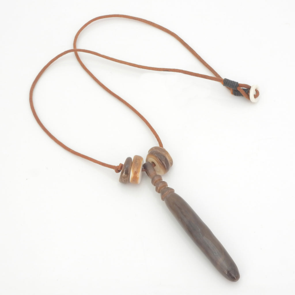 Carved Fossilized Tusk On Cord Necklace