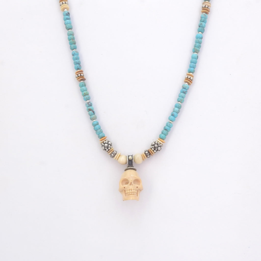 Sterling Silver Turquoise & Carved Fossilized Tusk Skull Necklace