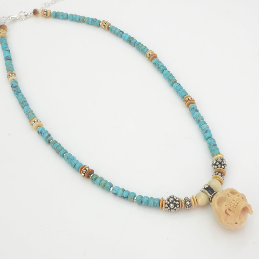 Sterling Silver Turquoise & Carved Fossilized Tusk Skull Necklace